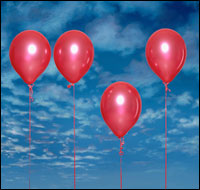 red balloons with cloud background